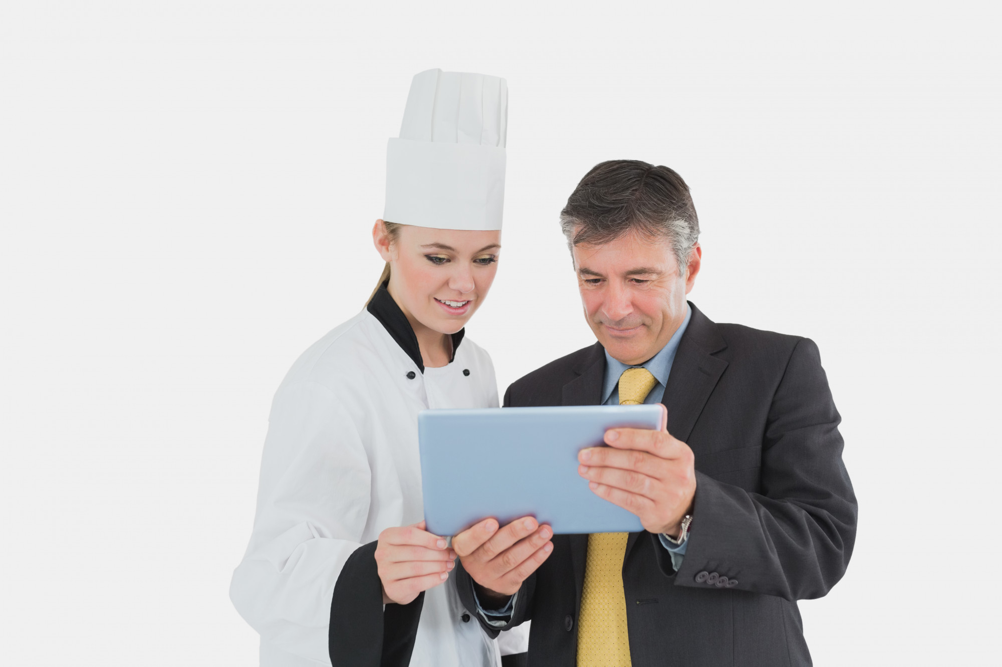 consultation with chef and tablet showing metrics